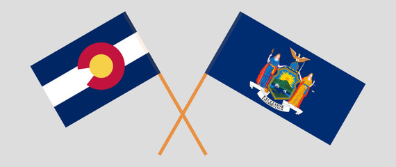 Crossed flags of The State of Colorado and The State of New York. Official colors. Correct proportion