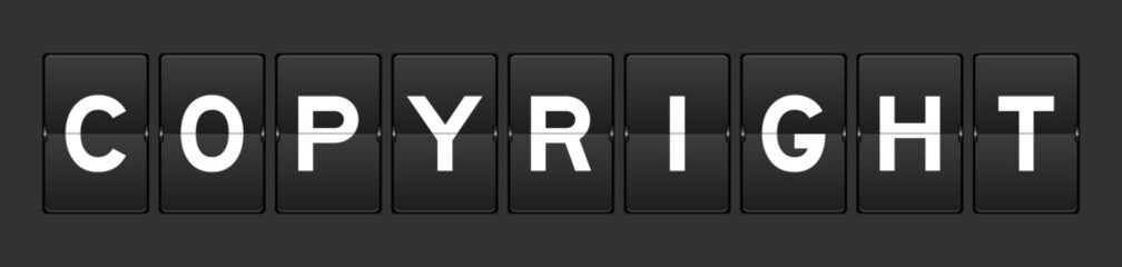 Black color analog flip board with word copyright on gray background