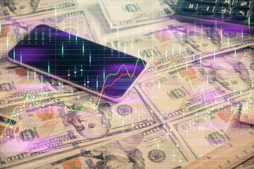 Double exposure of forex graph drawing over us dollars bill background. Concept of financial markets.