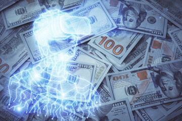 Double exposure of man wearing VR glasses drawing over usa dollars bill background. Concept of virtual reality.