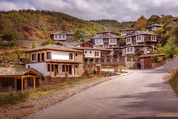 Fototapeta na wymiar Autumnal scenery with old traditional houses in Leshten, Rhodope mountains, Bulgaria