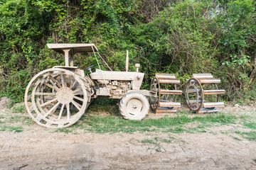 Fototapeta na wymiar Dirty tractor for work in the rice plantation