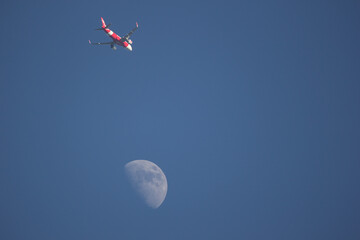 Passenger Airplane and the moon