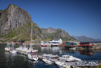 Fototapeta na wymiar Boats in the harbour at Hamnoya, Moskenesøya, Lofoten Islands, Nordland, Norway