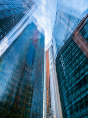 Abstract skyscrapers, multi exposure of city offices. Concept for construction, futuristic modern...