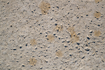 Concrete texture for the background. Abstract colored pattern on a concrete surface as a background. Structure of an old destroyed wall for vintage style.
