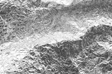 silver rough wrinkle foil texture. aluminum foil texture background. metal plate