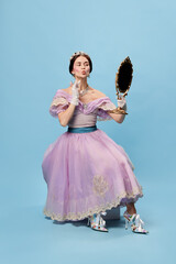 Self loving. Beautiful charming woman in lilac color vintage dress as a royal person, princess...