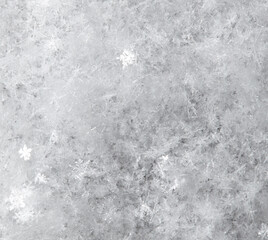 White snowflakes in winter as a background.