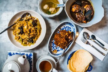A Peranakan Chinese Malay mixed heritage cuisine meal of various dishes