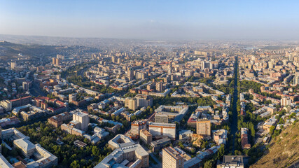 Fototapeta na wymiar Panoramic aerial view of Yerevan city on sunny summer day, Armenia.