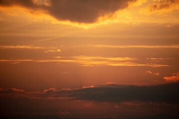 Colorful clouds at sunset as background.