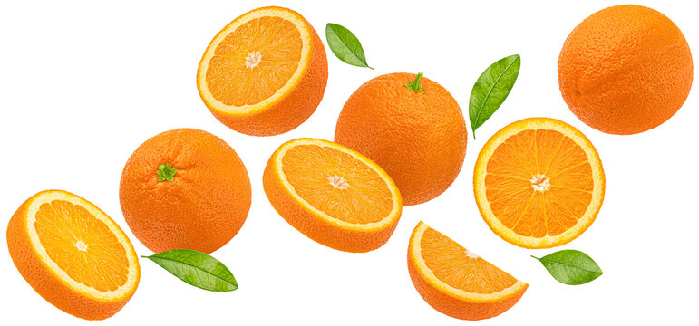 Falling orange fruits isolated on white background