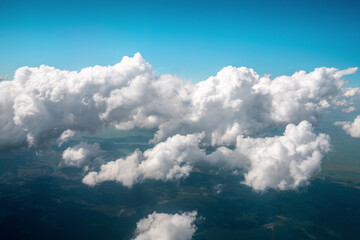 A panoramic top view of daylight and over all clouds under the blue sky, Sky clouds and mountains view, wallpaper concept.