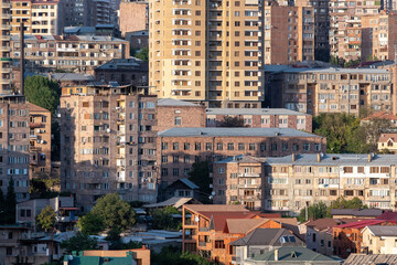 Fototapeta na wymiar View of residential buildings on sunny summer evening. Yerevan, Armenia.