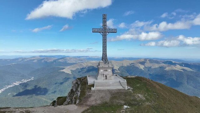 View of the Cross of Heroes on Mount Caraiman in the Bucegi Mountains, Romania