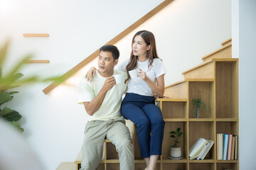 Couple, 2 people or lover to drink coffee together in home in morning. Include coffee cup or mug, house interior decoration, stair, bookshelf. Concept for lifestyle, love, happy, family, relationship.
