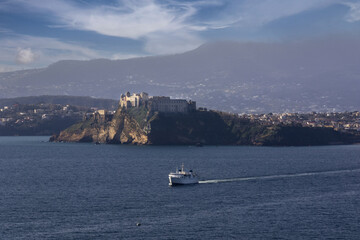 A boat takes tourists between Ischia and Procida. Napoli in Italy Europe. Beautiful holidays