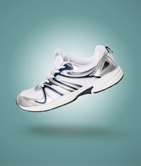 Modern new sneaker on color background for fashion concept
