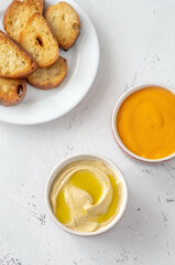 Bread with cheddar sauce and hummus