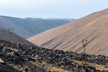 Power line on Aragats Mount slope (over 3000 m above sea level), Armenia.
