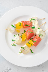 Skewers with cheese and trout