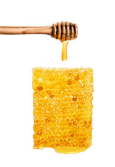 Honey isolated on white or transparent background. Honeycomb and honey dipper with drop of honey.