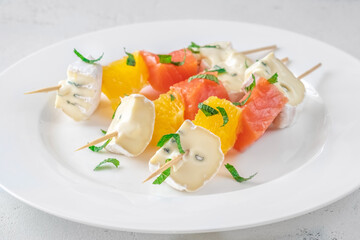 Skewers with cheese and trout