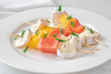 Skewers with cheese and trout