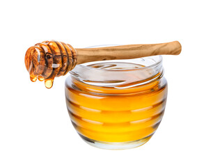 Honey isolated on white or transparent background. Jar with honey and honey dipper with drop of...