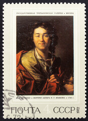 Postage stamp 'Portrait of the actor F.G. Volkova, A.P. Losenko, 1763' printed in USSR. Series: 'Russian painting of the 18th - early 19th centuries.' design by N. Cherkasov, 1972