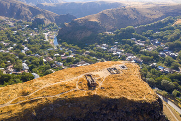 Aerial view of remains of Bjni fortress on sunny summer day. Bjni village, Kotayk Province, Armenia.