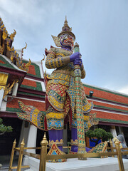 The giant guarding the temple's door at Wat Phra Kaeo 12th, named, askanmara, seven-faced purple...