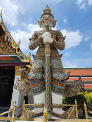 The giant guarding the temple's door at Wat Phra Kaew.The second  has a name,SAHASSADEJA, white body with 1,000 heads 2,000 standing and holding a mace.It is a very powerful giant. Bangkok,Thailand