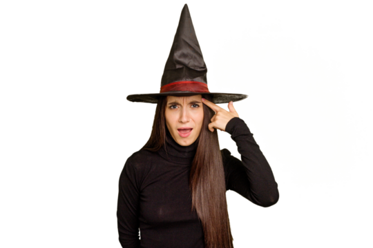 Young caucasian woman dressed as a witch for halloween day isolated showing a disappointment gesture with forefinger.