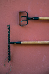 Pitchforks for Garden Work on a Wall