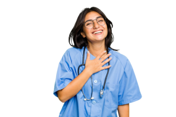 Young nurse Indian woman isolated laughs out loudly keeping hand on chest.