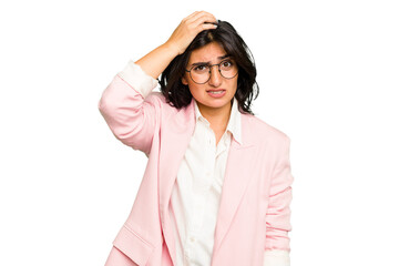 Young Indian business woman wearing a pink suit isolated being shocked, she has remembered...