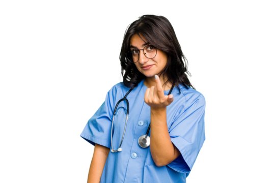 Young nurse Indian woman isolated pointing with finger at you as if inviting come closer.