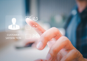 Customer service and Satisfaction concept. Businesswoman pressing smiley face emoticon on virtual touch screen. Excellent rating. Customer service evaluation concept. .rating to service experience.