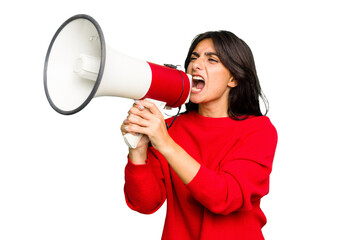 Young Indian woman holding a megaphone isolated - obrazy, fototapety, plakaty