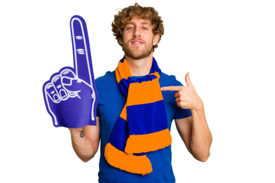 Young caucasian sports fan man isolated on white background person pointing by hand to a shirt copy space, proud and confident