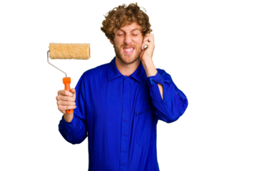 Young painter man holding a roll isolated on white background covering ears with hands.
