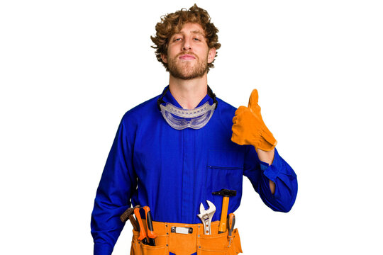 Young caucasian electrician man isolated on white background smiling and raising thumb up