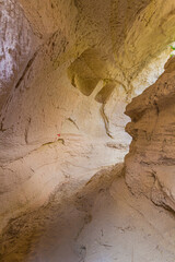Natural tunnel carved by a stream in Cappadocia, Turkey
