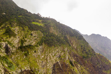 Fototapeta na wymiar Drone photography of cloudy mountain forest
