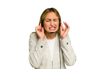 Telemarketer caucasian woman working with a headset isolated on green chroma background covering...