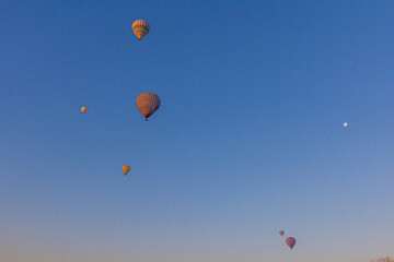 Hot air balloons with a moon