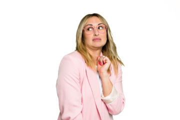 Young caucasian woman isolated on green chroma background confused, feels doubtful and unsure.