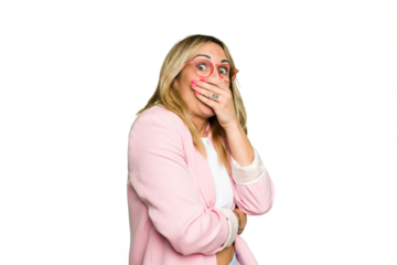 Young caucasian woman isolated on green chroma background scared and afraid.